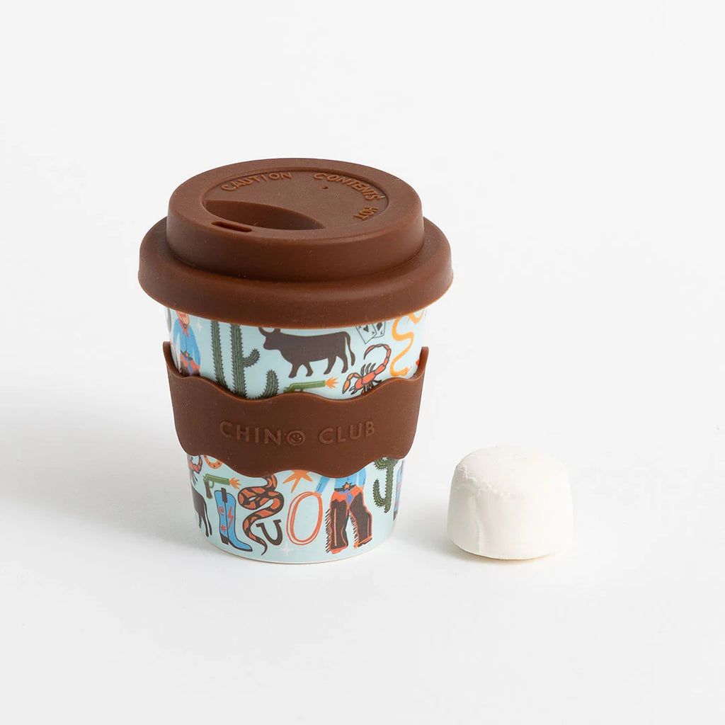 4 oz reusable coffee cup with brown lid and cowboy-themed CHINO CLUB print