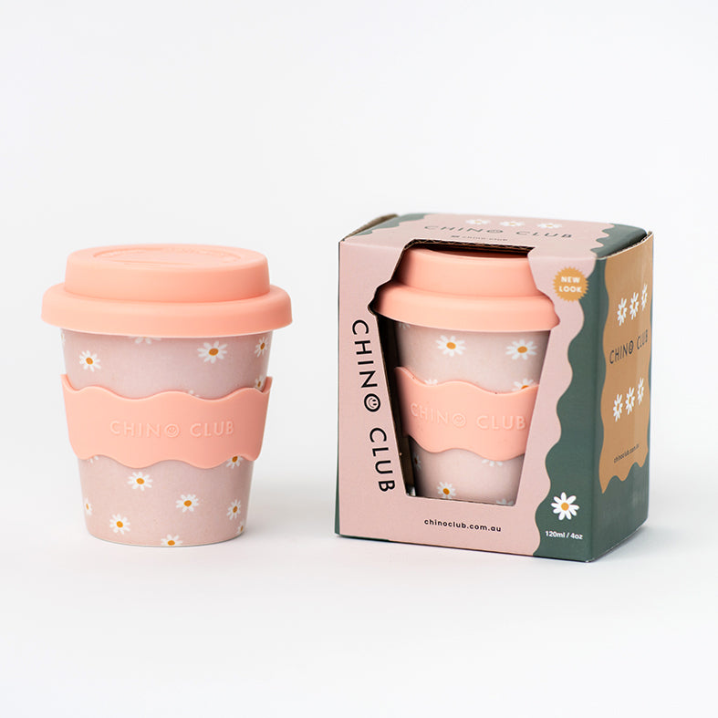 Pink daisy babychino cup with straw in box packaging