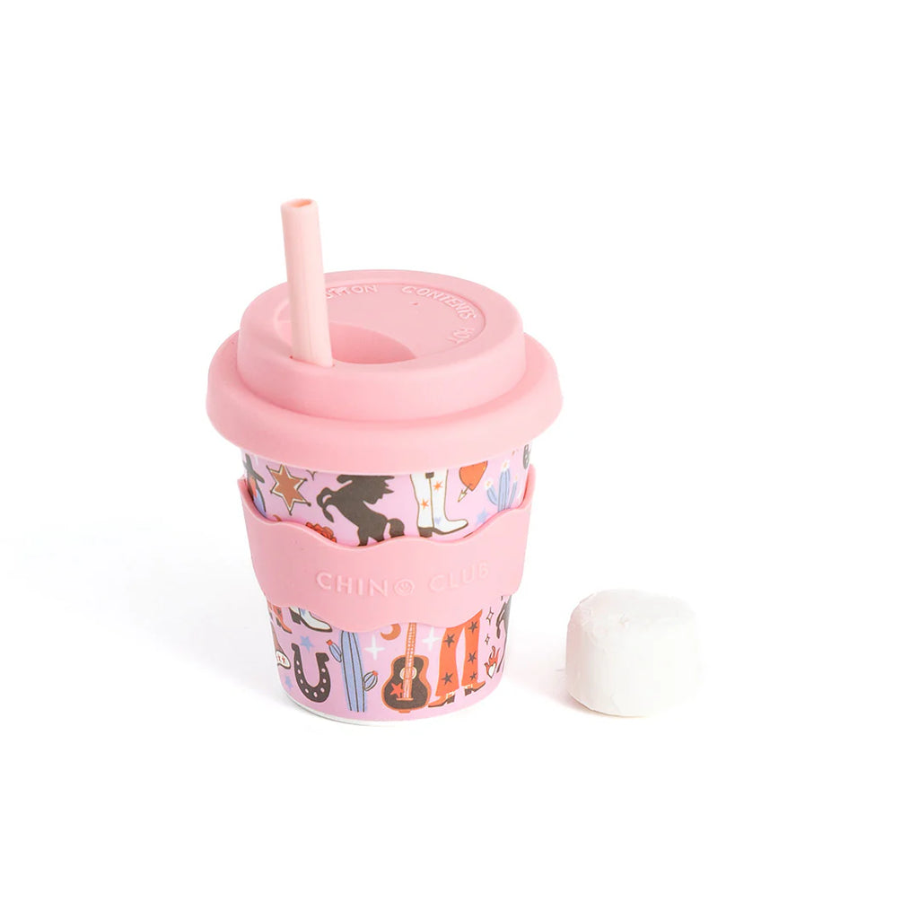 Pink keep cup with cowgirl pattern, fitted lid and reusable straw