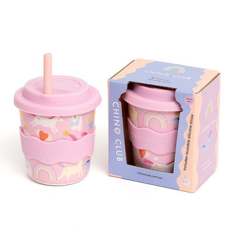 Pink unicorn keep cup with lid and straw, shown with gift box