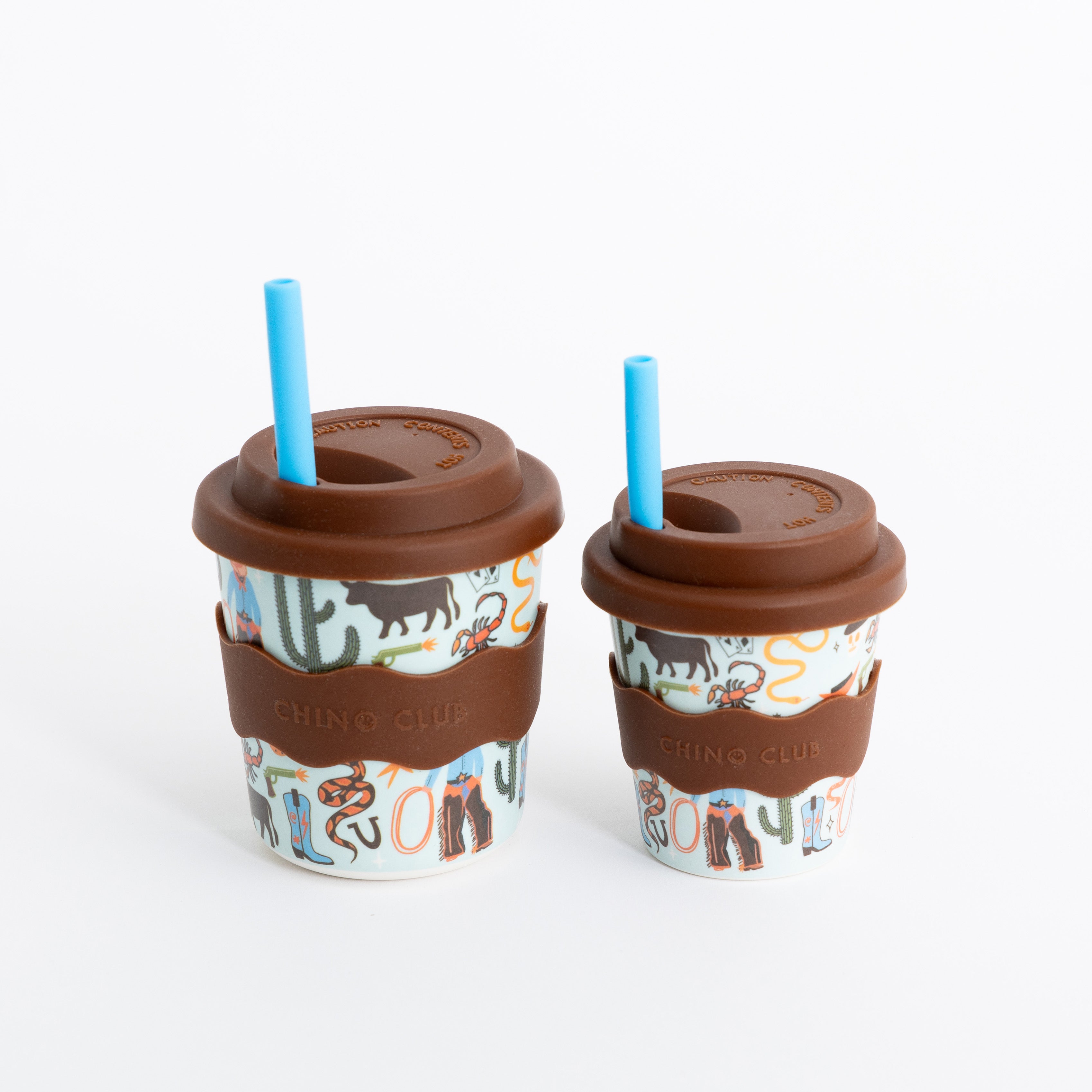 Two 8oz keep cups with brown lids and blue straws, cactus and cowboy print