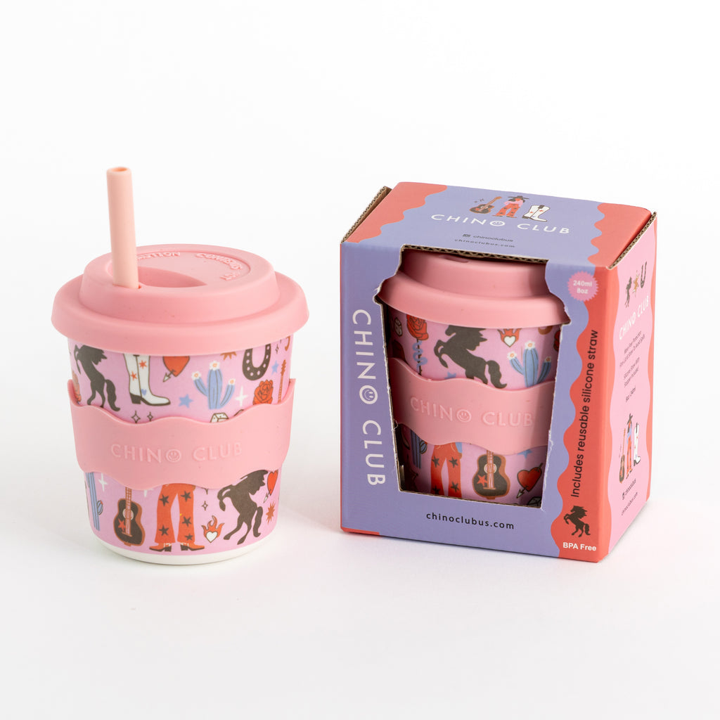 Pink keep cup with lid and straw, cowgirl print, shown with retail box, 8 oz