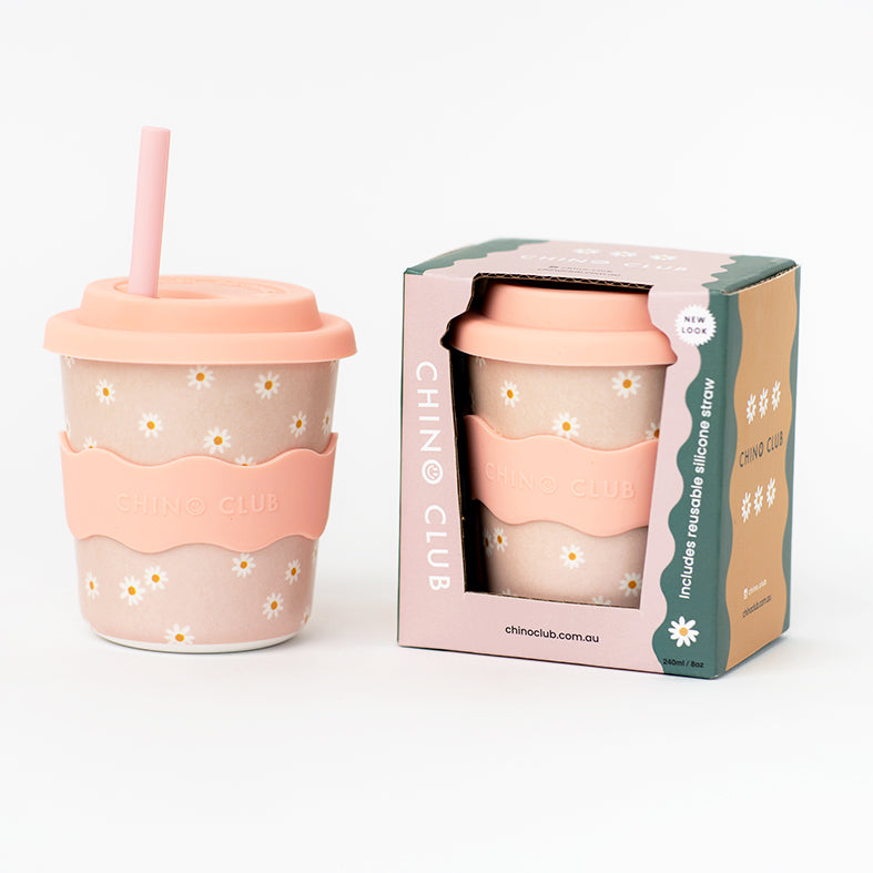 Pink daisy keep cup with straw, silicone lid, and CHINO CLUB text; in gift box